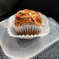 Chocolate cupcake with chocolate butter cream icing and seasonal sprinkles. Chocolate Chocolate