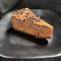 Chocolate drizzle, chocolate chips, chocolate crust, chocolate cheesecake, chocolate lovers' delight. Death by Chocolate