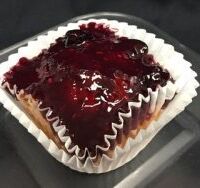 A triple berry pound cake topped with a triple berry glaze. Triple Berry