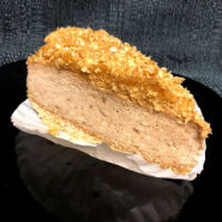 An apple pie in cheesecake form, complete with caramel apple pie crumble.