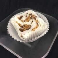 A brownie Boo Boo cookie cupcake, topped with vanilla buttercream, and finished with crumbled Boo Boo cookie! Brookie