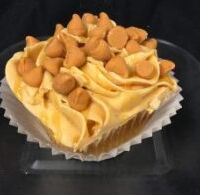 A butterscotch cupcake topped with butterscotch cream cheese, finished with a butterscotch drizzle and butterscotch chips. Butterscotch Beer