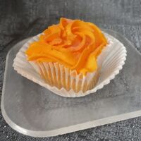 A cranberry poundcake with orange flavoured cream cheese icing and sprinkled with cranberry sugar. Cranberry Orange